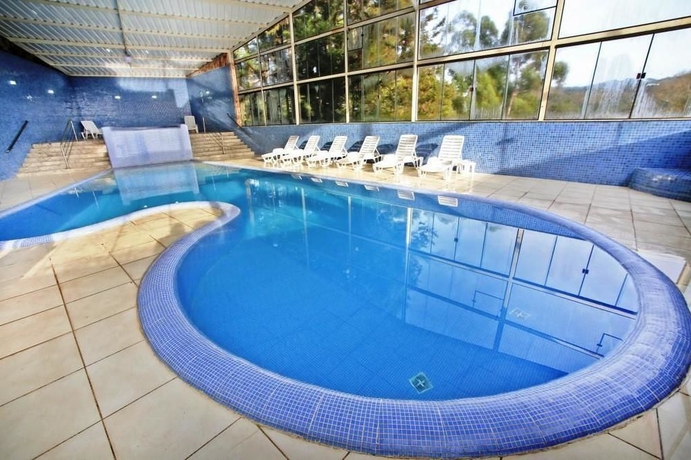 Imagen de la piscina del Hotel Nacional Inn Campos Do Jord&atilde;o. Foto 8