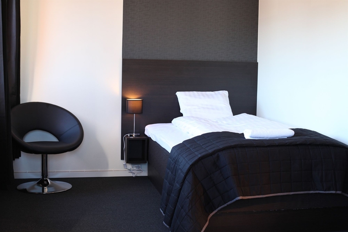 Imagen de la habitación del Hotel Nacka Stadshotell. Foto 12
