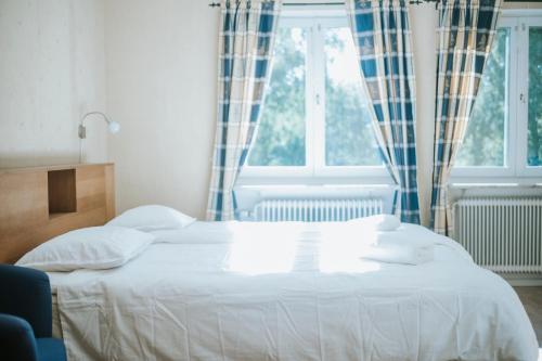 Imagen de la habitación del Hotel Naddenl & Konferens. Foto 18