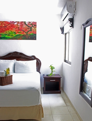Imagen de la habitación del Hotel Nadet Suites. Foto 4