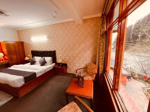 Imagen general del Hotel Nadi Kinare , Mall Road Manali - A Riverside Resort. Foto 4