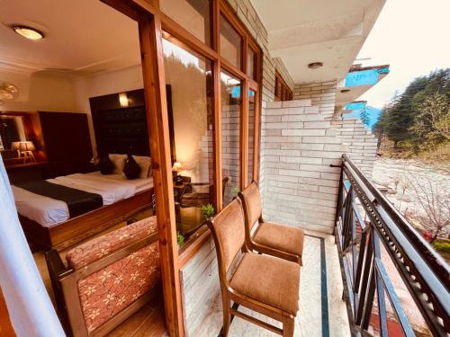 Imagen general del Hotel Nadi Kinare , Mall Road Manali - A Riverside Resort. Foto 16