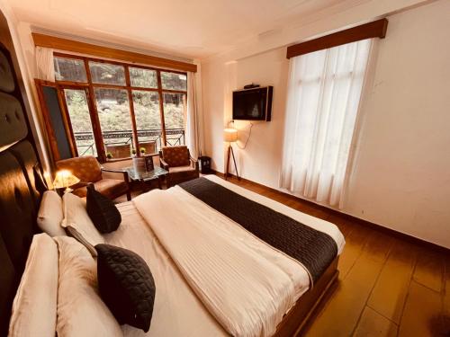 Imagen general del Hotel Nadi Kinare , Mall Road Manali - A Riverside Resort. Foto 18