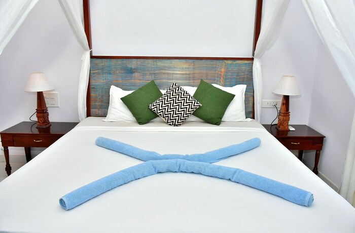 Imagen de la habitación del Hotel Naga Cottages. Foto 19