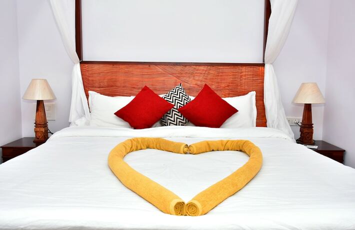 Imagen de la habitación del Hotel Naga Cottages. Foto 35