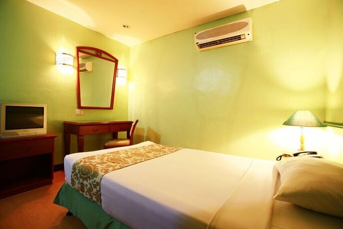 Imagen de la habitación del Hotel Naga Regent. Foto 25