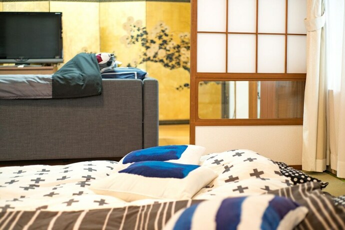 Imagen de la habitación del Hotel Naha Asahibashi Condominium Holiday. Foto 22