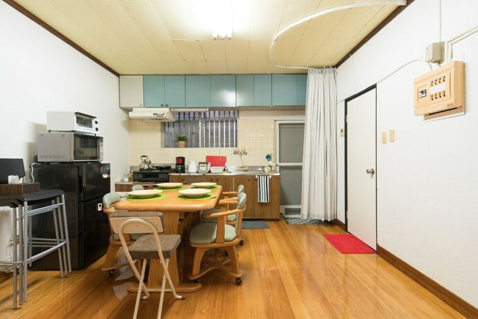 Imagen de la habitación del Hotel Naha Asahibashi Condominium Holiday. Foto 23