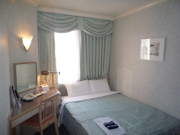 Imagen de la habitación del Hotel Naha Grand. Foto 5