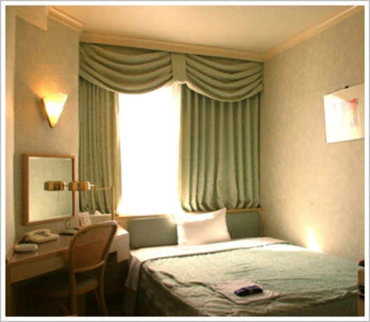 Imagen de la habitación del Hotel Naha Grand. Foto 6