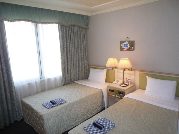 Imagen de la habitación del Hotel Naha Grand. Foto 7