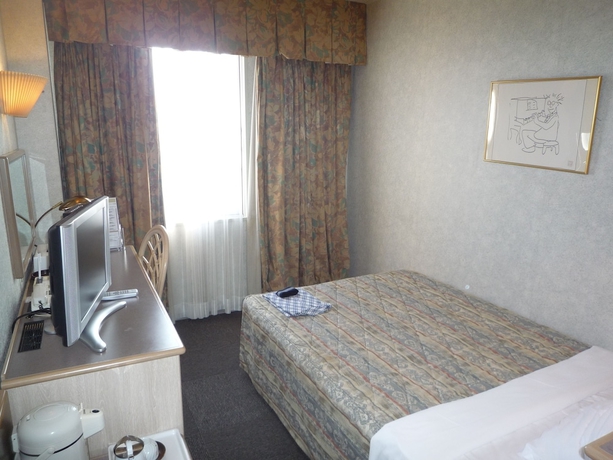 Imagen de la habitación del Hotel Naha Grand. Foto 9