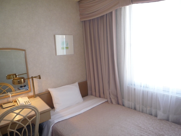 Imagen de la habitación del Hotel Naha Grand. Foto 11