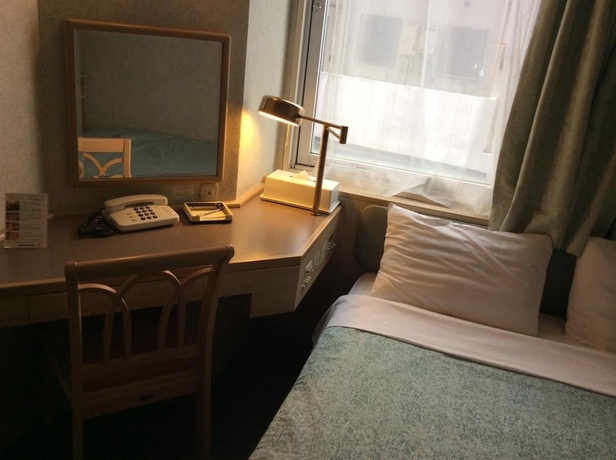 Imagen de la habitación del Hotel Naha Grand. Foto 15