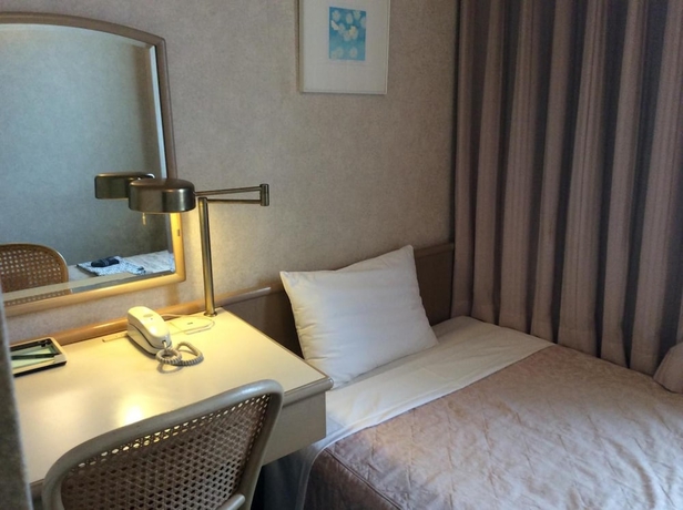 Imagen de la habitación del Hotel Naha Grand. Foto 16