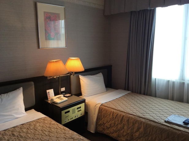 Imagen de la habitación del Hotel Naha Grand. Foto 17