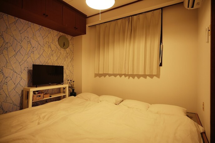 Imagen de la habitación del Hotel Naha Southerlies Condominium Kumoji. Foto 17