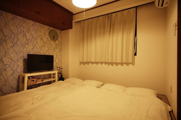 Imagen de la habitación del Hotel Naha Southerlies Condominium Kumoji. Foto 19