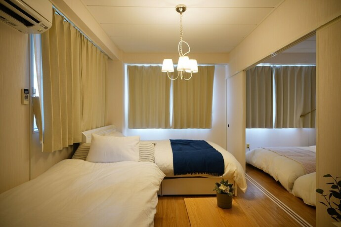 Imagen de la habitación del Hotel Naha Southerlies Condominium Kumoji. Foto 21