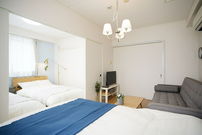 Imagen de la habitación del Hotel Naha Southerlies Condominium Kumoji. Foto 22