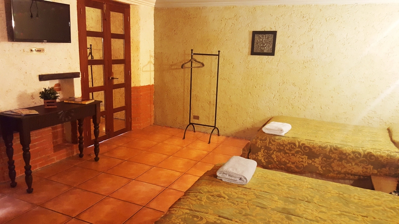 Imagen de la habitación del Hotel Naif Boutique. Foto 8