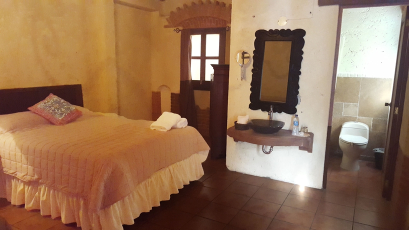 Imagen de la habitación del Hotel Naif Boutique. Foto 10