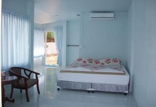 Imagen de la habitación del Hotel Naiharn On The Rock Resort. Foto 8