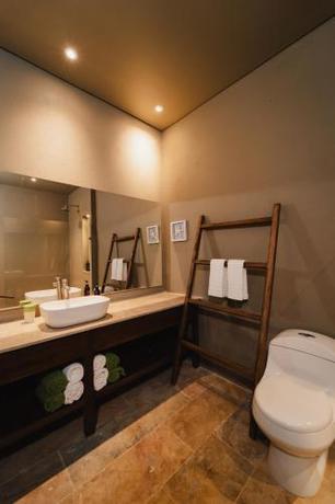 Imagen de la habitación del Hotel Naio y Villas. Foto 14