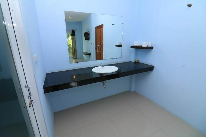 Imagen de la habitación del Hotel Naitawan Resort. Foto 9