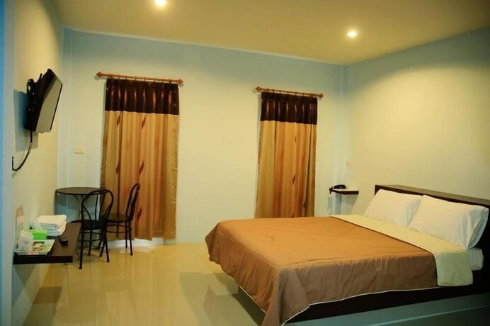 Imagen de la habitación del Hotel Naitawan Resort. Foto 10