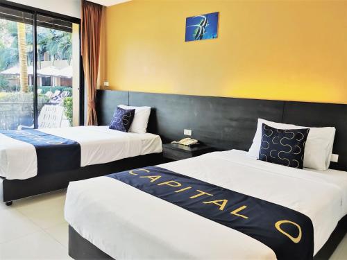 Imagen de la habitación del Hotel Naiyang Beach. Foto 8