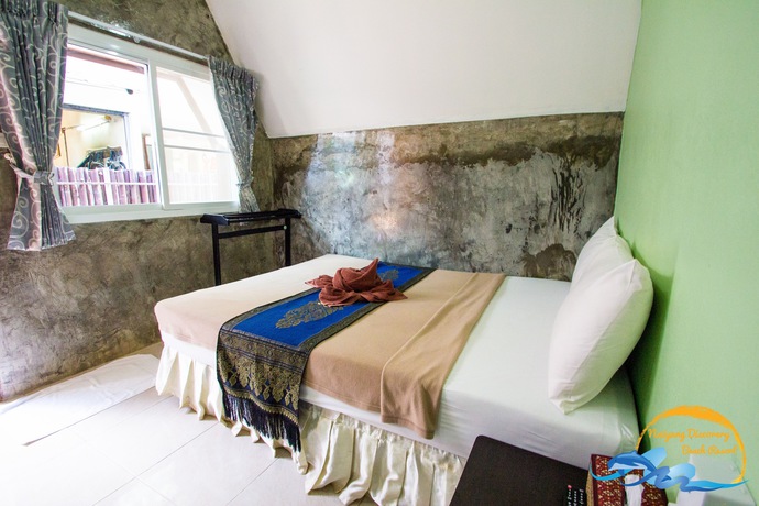 Imagen de la habitación del Hotel Naiyang Discovery Beach Resort. Foto 16