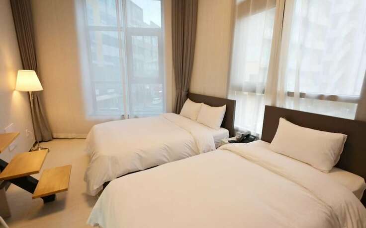 Imagen de la habitación del Hotel Naju Duplex Residence. Foto 20
