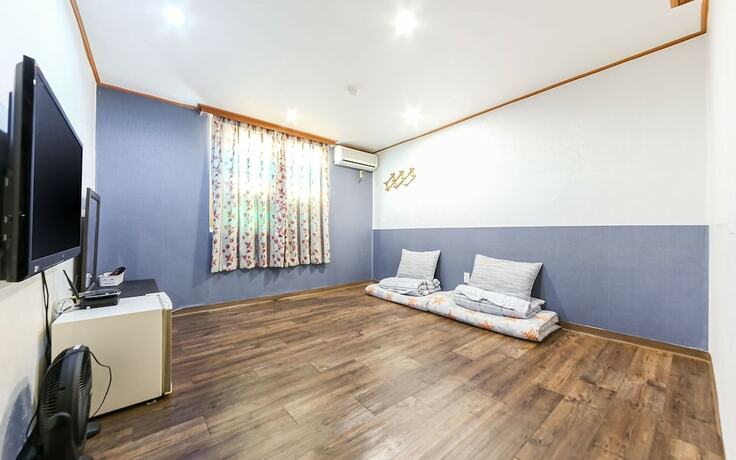 Imagen de la habitación del Hotel Naju Q. Foto 3