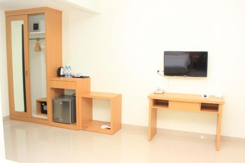 Imagen de la habitación del Hotel Naka Kupang. Foto 7