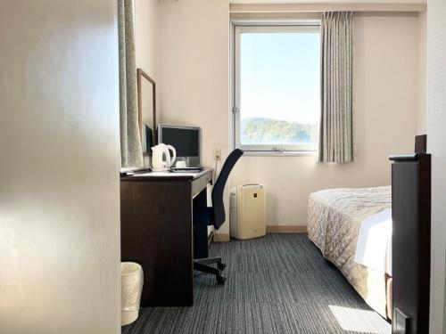 Imagen de la habitación del Hotel Nakamura Daiichi. Foto 15