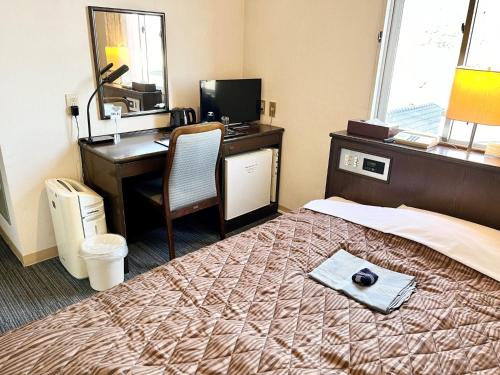 Imagen de la habitación del Hotel Nakamura Daiichi. Foto 17