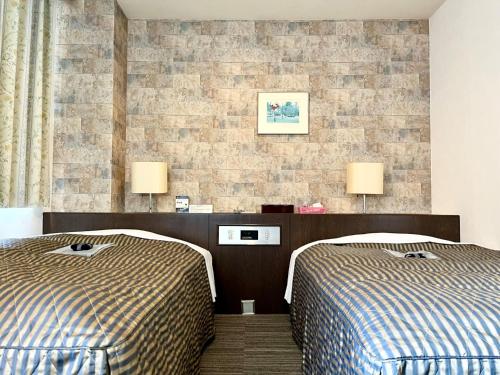 Imagen de la habitación del Hotel Nakamura Daiichi. Foto 19