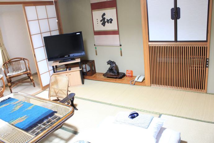 Imagen de la habitación del Hotel Nakatono. Foto 7