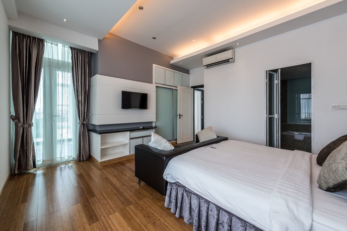 Imagen de la habitación del Hotel Naki Suites At Silvertown. Foto 4