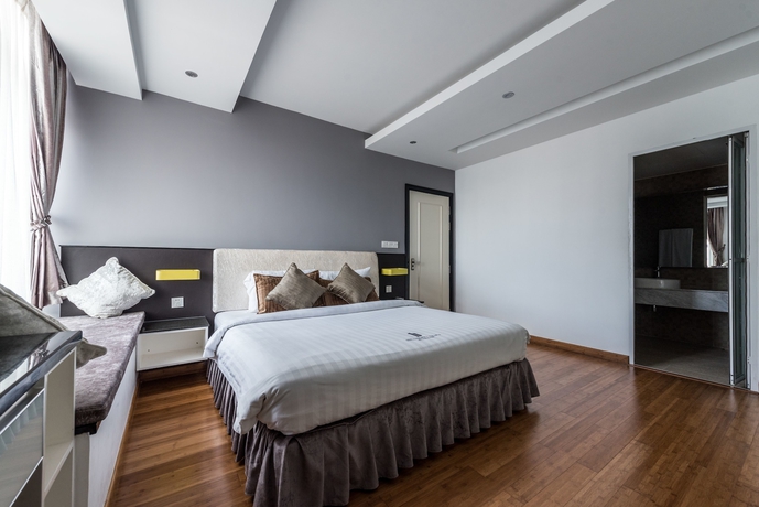Imagen de la habitación del Hotel Naki Suites At Silvertown. Foto 10