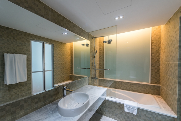Imagen de la habitación del Hotel Naki Suites At Silvertown. Foto 12