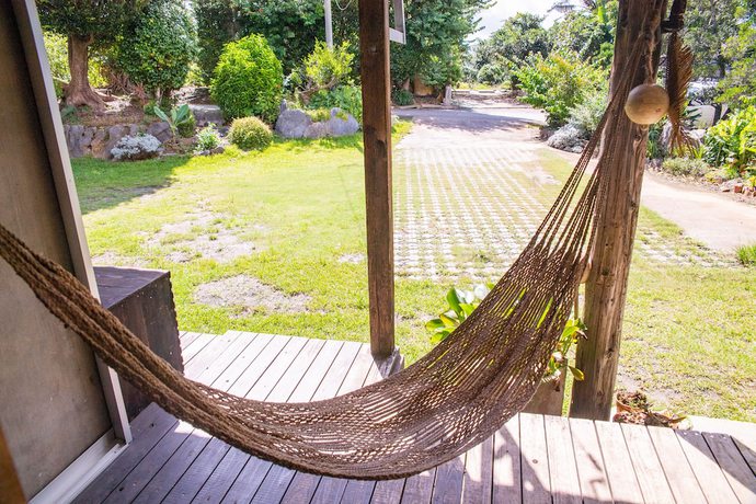 Imagen de la habitación del Hotel Nakijin Kominkanoyado Tsubameya. Foto 8