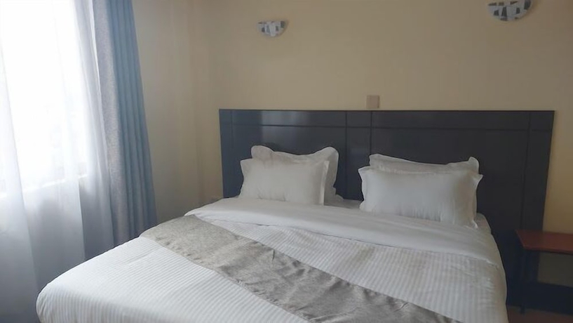 Imagen de la habitación del Hotel Nakuru Axis. Foto 4