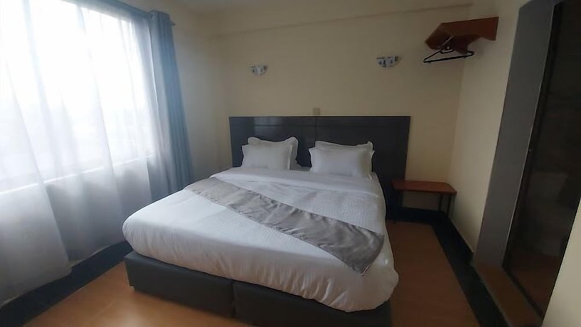 Imagen de la habitación del Hotel Nakuru Axis. Foto 7