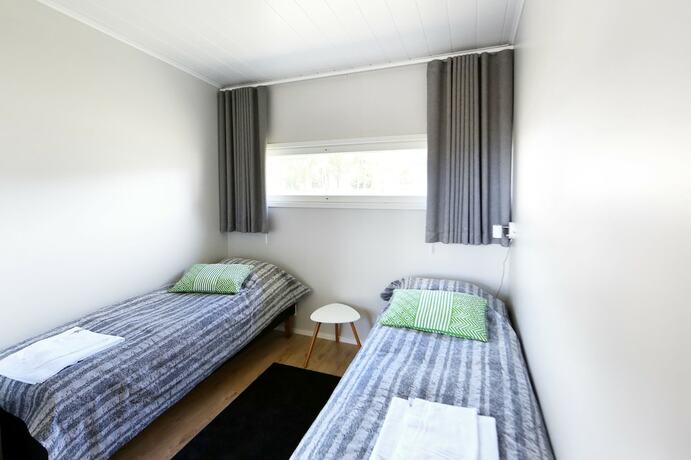 Imagen de la habitación del Hotel Nallikari Holiday Village Villas. Foto 12