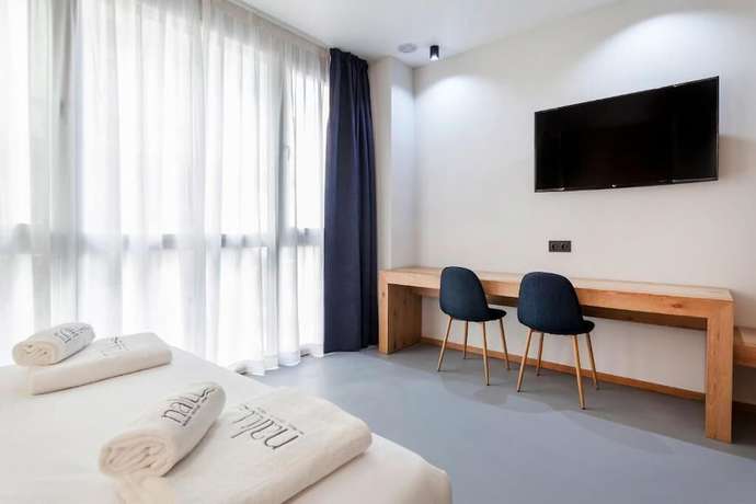 Imagen de la habitación del Hotel Nalu Valencia Boutique Rooms. Foto 4