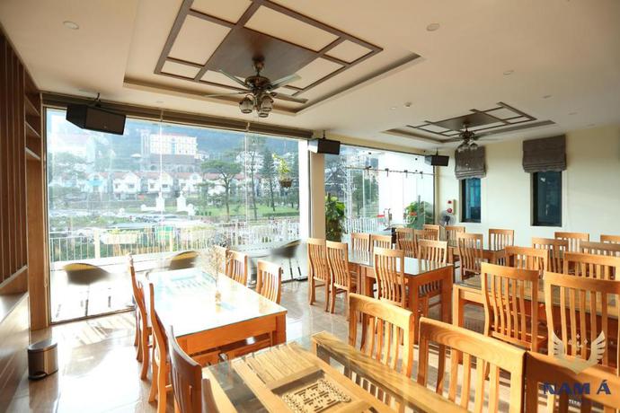 Imagen del bar/restaurante del Hotel Nam A Hotel. Foto 8