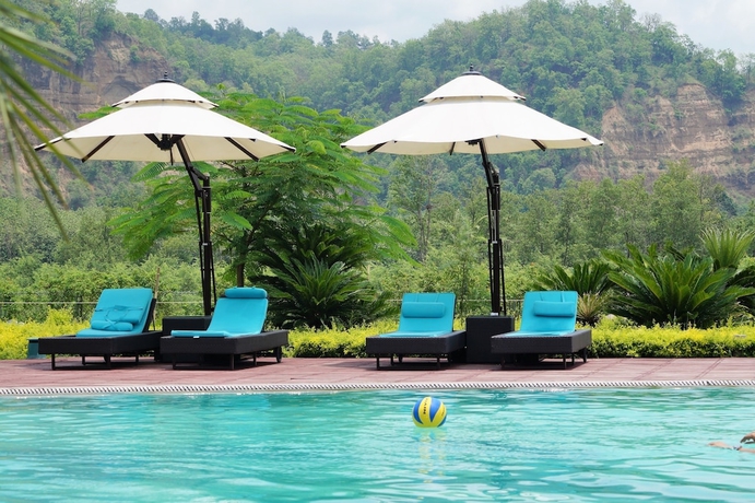 Imagen de la piscina del Hotel Namah Resort Jim Corbett, A Member Of Radisson Individuals. Foto 13