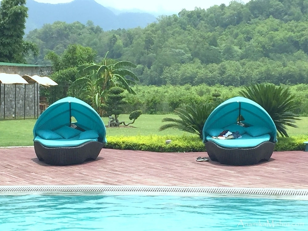 Imagen de la piscina del Hotel Namah Resort Jim Corbett, A Member Of Radisson Individuals. Foto 16